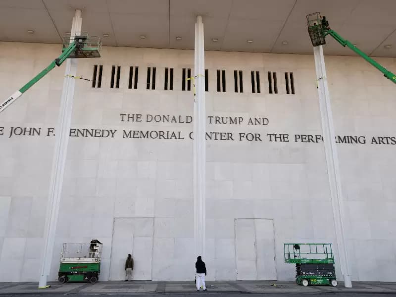 The newly added lettering for U.S. President Donald Trump's name is displayed at the facade of the John F. Kennedy Center for the Performing Arts, a day after its board announced it would rename the institution The Donald J. Trump and The John F. Kennedy Memorial Center for the Performing Arts, in Washington, D.C., U.S., December 19, 2025.