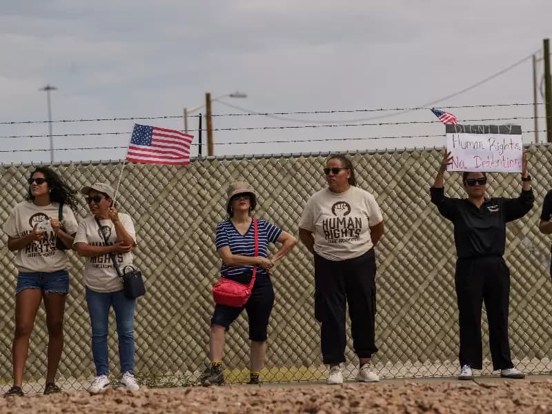 FILE PHOTO: Protesters opposing mass deportations by ICE at the Cassidy Gate at Fort Bliss, in El Paso, Texas, U.S., August 17, 2025.