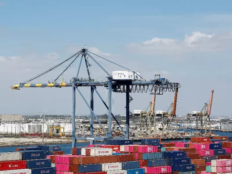 FILE PHOTO: Shipping containers are stacked at a terminal at the port of Los Angeles in Long Beach, California, U.S., March 10, 2026.