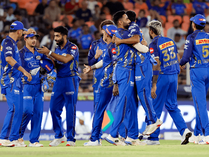 Mumbai Indians' Ashwani Kumar celebrates with teammates after taking the wicket of Gujarat Titans' Rahul Tewatia during the Indian Premier League (IPL) 2026 match between Gujarat Titans and Mumbai Indians in Ahmedabad on Monday, April 20, 2026.