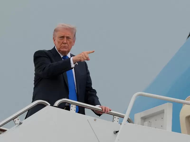 FILE PHOTO: U.S. President Donald Trump boards Air Force One en route to Palm Beach International Airport, at Joint Base Andrews, Maryland, U.S., April 24, 2026.