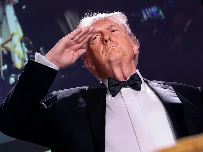 U.S. President Donald Trump salutes during the annual White House Correspondents' Association dinner in Washington, D.C., U.S., April 25, 2026.