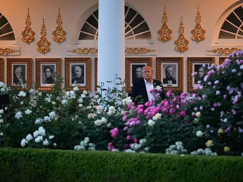U.S. President Donald Trump looks at the Rose Garden upon arrival at the White House in Washington, D.C., U.S., May 3, 2026.