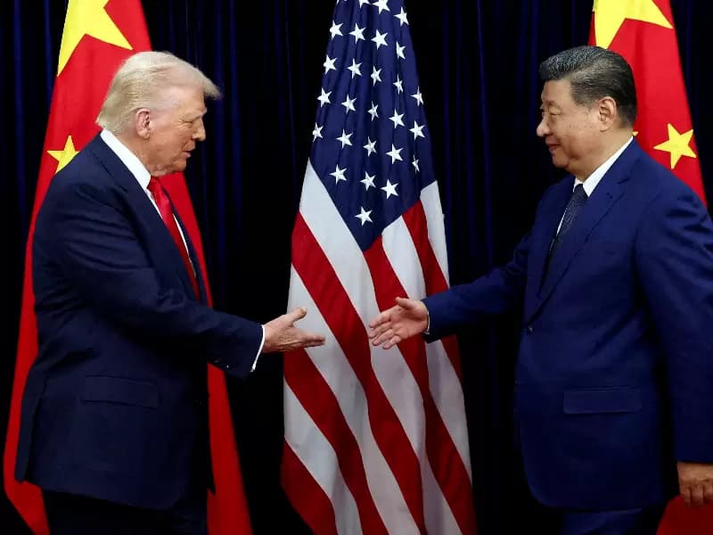 U.S. President Donald Trump shakes hands with Chinese President Xi Jinping in Busan, South Korea, October 30, 2025.