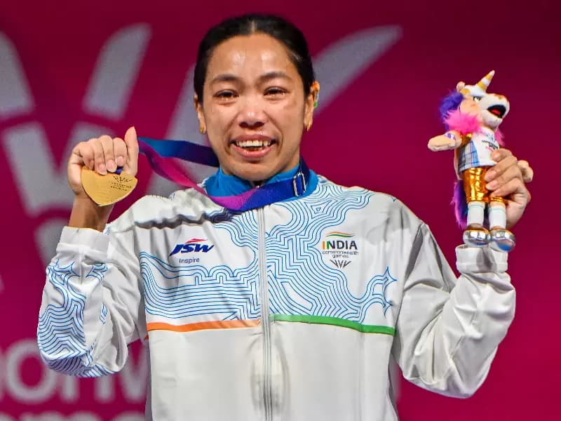 India's Mirabai Chanu reacts after winning the gold medal in the women's 48kg weightlifting event during the presentation ceremony at the Commonwealth Games 2026 in Glasgow, Scotland, on Sunday, July 26, 2026.