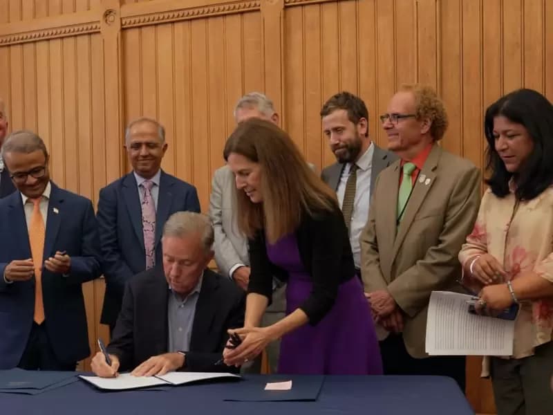 Gov. Ned Lamont signed Senate Bill 132 into law at the State Capitol in Hartford