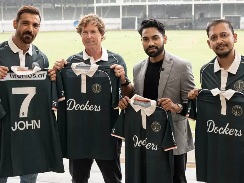 (From L) Rotterdam Dockers Co-Owners John Abraham and Jonty Rhodes along with Fireflies.ai Co-founder & CEO and Founding Investor of Rotterdam Dockers Krish Ramineni and Rotterdam Dockers Founder & Managing Director Madhukar Shree during jersey launch event ahead of ETPL 2026 in Mumbai on Tuesday, August 11, 2026.