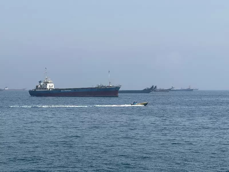 This photo taken with a mobile phone shows merchant vessels stranded in the waters of the Strait of Hormuz, near Khasab, a small town in northern Oman, May 29, 2026.